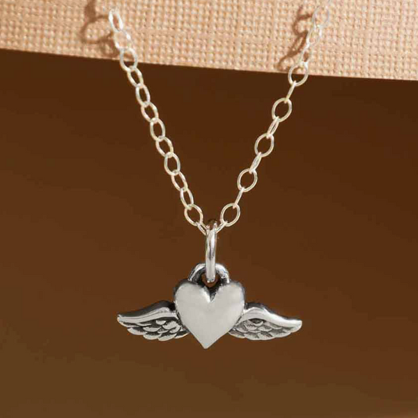 STERLING SILVER FLYING HEART  NECKLACE