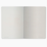 Open notebook with lined pages on a white background