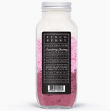 Bottle of Finch bath soap with pink scrub on a white background