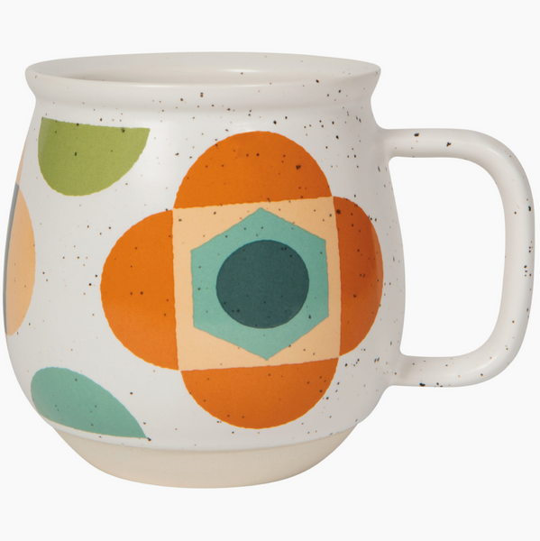 Ceramic mug with geometric pattern on a white background