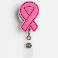 Pink breast cancer awareness ribbon badge holder on a white background