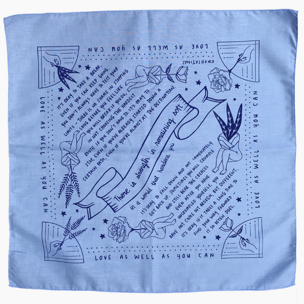 Light blue fabric with black printed design and text on a white background