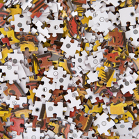 Scattered puzzle pieces with a mix of colors on a white background