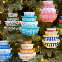 Colorful stacked bowls on a Christmas tree