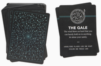 Black playing cards with star pattern and text on a white background