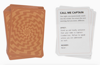 Two sets of cards, one with a brown spiral design and the other with text instructions, on a computer screen.