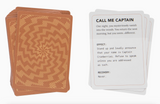 Two sets of cards, one with a brown spiral design and the other with text instructions, on a computer screen.