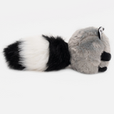 Plush toy raccoon on a computer screen with a white background