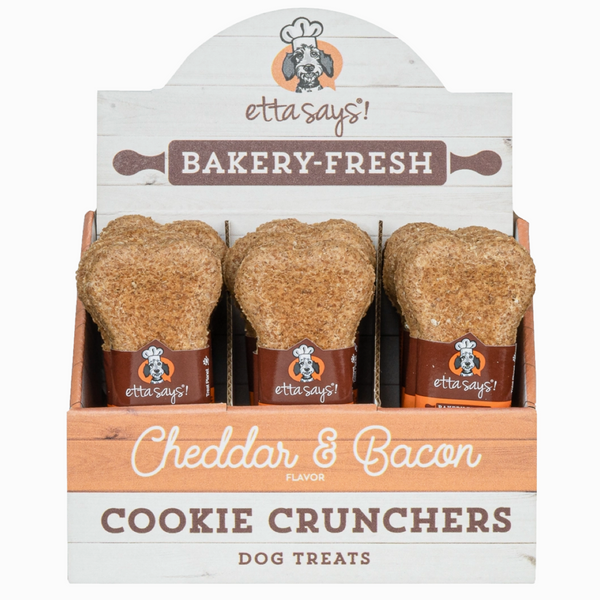 Package of 'etta says!' Cheddar & Bacon Cookie Crunchers dog treats on a white background