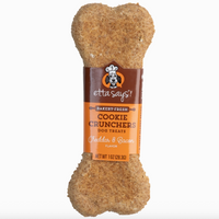 Dog treat shaped like a bone with a label on a white background
