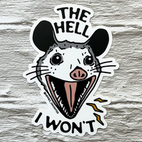 Sticker with a mouse design and text on a wooden surface