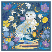 Celestial Owl puzzle packaging with owl and flowers on a blue background
