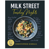 Book cover of 'Milk Street Tuesday Nights' by Christopher Kimball with a dish image on a dark background.