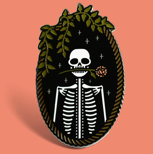 Illustration of a skeleton with a wreath on a peach background