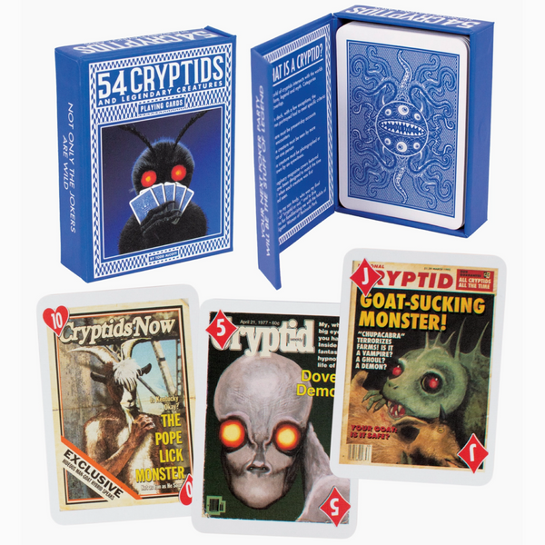 Collection of Cryptids-themed playing cards and packaging on a white background