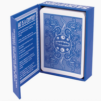 Blue playing card with intricate design on a white background