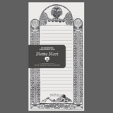 Decorative notebook with 'Memo Mori' design on a gray background
