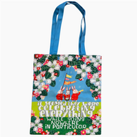 Tote bag with cartoon design and text on a white background