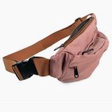 Pink waist bag with a brown strap on a white background