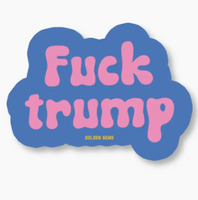 Sticker with 'Fuck trump' text in pink on a blue cloud-like background