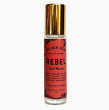 Perfume bottle labeled 'Rebel' on a white background