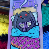 Bookmark - Mothman Reads In Bed